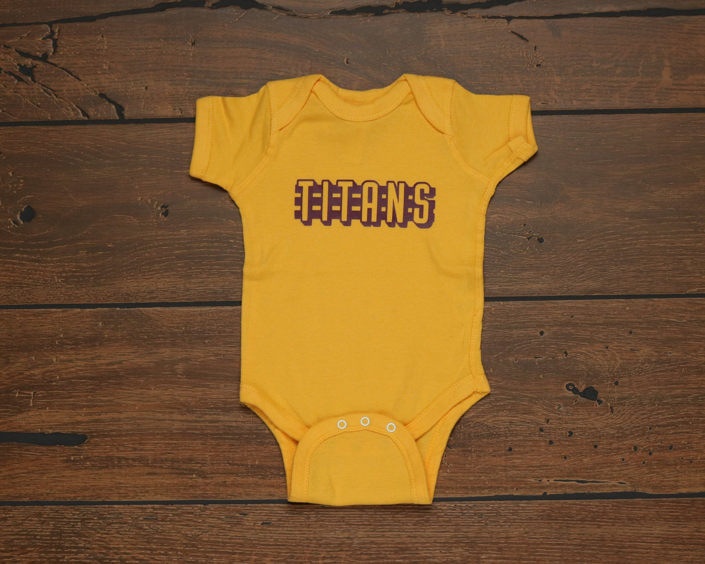 Titans fence onesie
